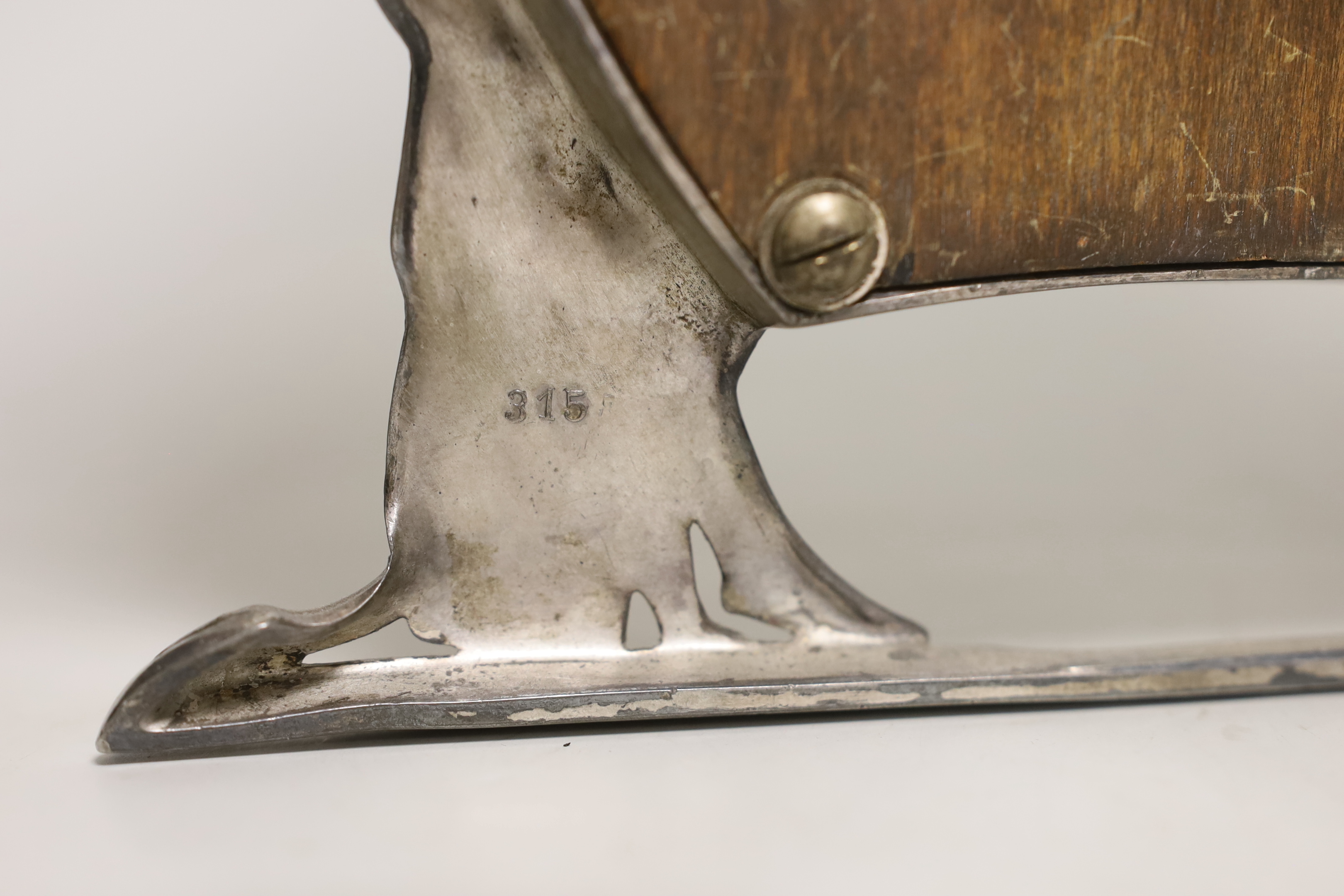 A WMF pewter toilet mirror, 42.5cm